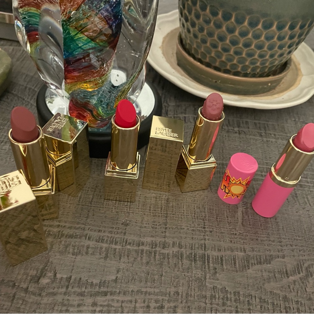 Estee Lauder Lipstick Collection with Gold and Pink Accents